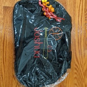 Embroidered kids travel bag in gift packaging.